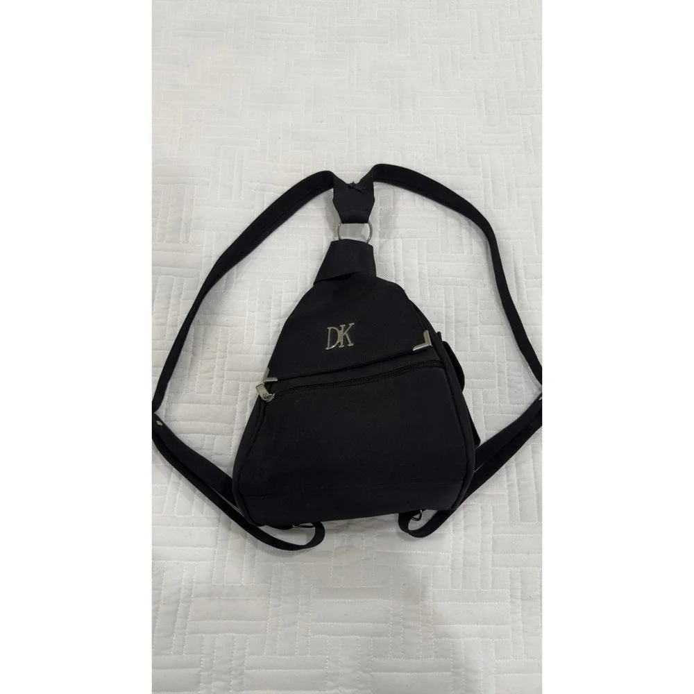 DKNY Donna Karan black‎ nylon sling crossbody backpack bag